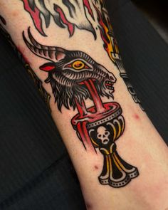 a person with a tattoo on their arm