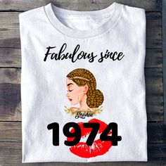 a white t - shirt that reads fabulous since 1974