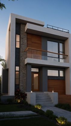 a modern house with stairs leading up to it