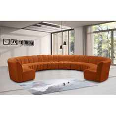 an orange sectional sofa in a modern living room