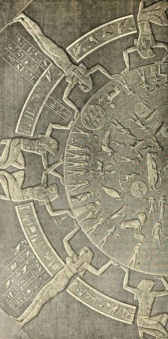 an intricate design on the side of a wall in a building, with people walking around it