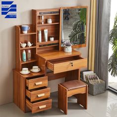 a wooden desk with drawers and a mirror on it, next to a potted plant