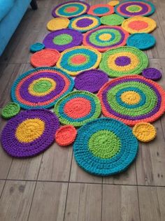 multicolored rugs on the floor in a living room