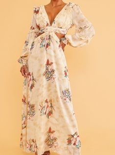 Turn heads in this gorgeous cut out floral print maxi. -Cut out side -Deep plunging neckline. -Sheer long sleeves and a lace up back closure. -Balloon sleeves with elastic cuffs -Polyester Maxi Dress With Wedges, Long Sleeve Floral Maxi Dress, Destination Dress, Long Dress Casual, Floral Print Maxi, Sleeve Maxi Dress, Long Sleeve Floral Dress, Maxi Gowns, Long Sleeve Maxi