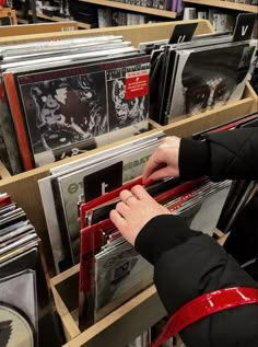 a person that is looking at some records