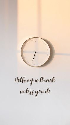 a clock with the words nothing will work unless you do