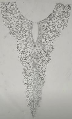 an intricately designed piece of art on white paper