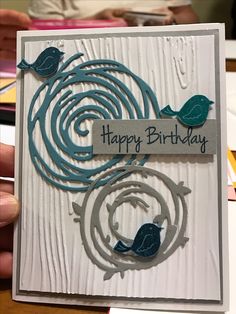 a handmade birthday card with two birds on it