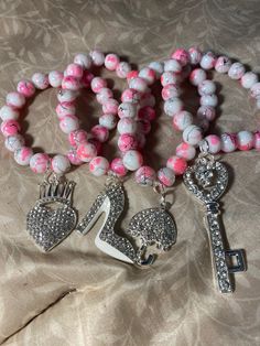 Pink and White Marble Beaded Charm Bracelet. Each bracelet comes with a random bling charm Marble Bracelets, Pink And White Bracelet, Pink And White Marble, Charm Bracelet Pink, Beaded Charm Bracelet, White Bracelet, White Bracelets, Silver Charm Bracelet, Bead Charm Bracelet