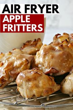 an image of some food that is on a rack with the words air fryer apple fritters