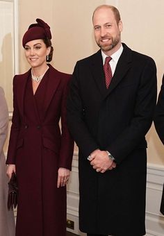 three men and two women dressed in business attire