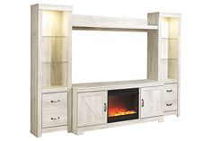 an entertainment center with a fireplace in it