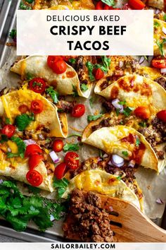 delicious baked crispy beef tacos with tomatoes and onions