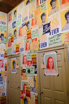 a wall covered with posters and pictures of people's faces on them, all in different colors