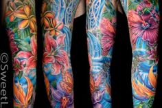 four different colored tattoos on both arms and legs