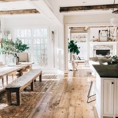 the kitchen is clean and ready to be used as a dining room or breakfast nook