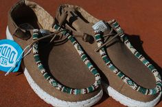 Made to order custom beaded Hey Dude shoes for men and women.  Available in a variety of styles and sizes. Choose from almost any shoe and over 100 bead color variations. Due to the unique design, each shoe may differ slightly from the picture shown. The Holden beaded Hey Dude shoes feature a rich dark green base with accents of turquoise, brown, tan opaque, and off-white. For the best care, hand wash and air dry only.  Wholesale rates are available upon request. Handmade in Wyoming, this produc Beaded Shoes, Hey Dude Shoes, Shoes Pattern, Hey Dudes, Shoe Pattern, Hey Dude, Shoes For Men, Boot Shoes Women, Wyoming