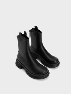 Presenting an ultra minimalist iteration of cowboy boots in a match-all black colourway. They feature curved cuffs and pull tabs at the sides that are emblematic of classic styles. Bonus points for the back zip that allows you to wear them easily. Let them keep your feet warm and toasty even as the temperatures dip. Ultra Minimalist, Black Cowboy, Platform Block Heels, Size Chart For Kids, Charles Keith, Platform Ankle Boots, Black Ankle Boots, Belt Size, Trending Shoes