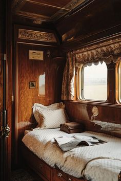 there is a bed in the cabin of a train