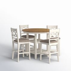 a table with four chairs around it on a white background in front of a wall