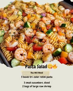 pasta salad with shrimp, tomatoes, cucumbers, zucchini and peppers