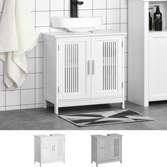 a white bathroom vanity with sink and towel rack