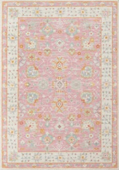 a pink and yellow rug with an ornate design