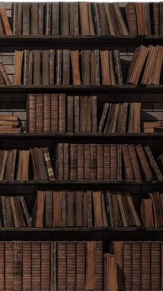 an old book shelf filled with lots of books