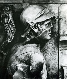 an old black and white photo of a busturine with a helmet on it's head