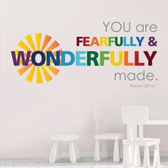 there is a colorful wall decal with the words you are fearless and wonderful made