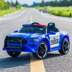 a toy police car is on the road