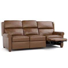 a brown leather reclining sofa and footstool with an ottoman on the side