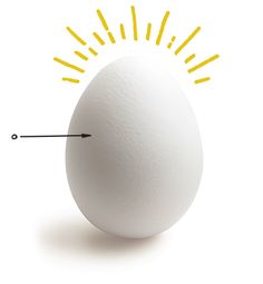 an egg with sun rays coming out of it's shell and the end pointing upward