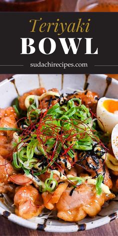 a bowl filled with meat and veggies on top of a wooden table next to an egg