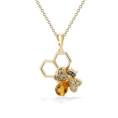 14K Honey Gold™ (Yellow Gold) Le Vian Aloha® Collection Honeycomb Bee Pendant with a 0.40 Carat Citrine and 0.16 Carats (total weight) of Chocolate Diamonds® and Vanilla Diamonds®. 18" 14K Yellow Gold Chain included. The pendant measures approximately 3/4" in total length, including the bail. Available exclusively at Na Hoku, Hawaii's Finest Jewelers Since 1924. Aloha Collection, Honeycomb Necklace, Bee Jewelry, Chocolate Diamonds, Bee Pendant, Le Vian, Yellow Gold Chain, Fine Jewels, Honeycomb