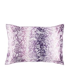 a purple and white pillow on a white background