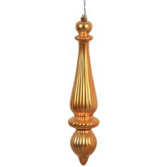 a gold colored lamp hanging from the ceiling