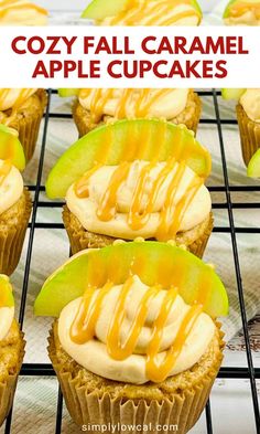 several cupcakes with caramel and apple toppings on a wire cooling rack