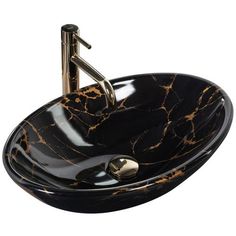 a black and gold bathroom sink with a faucet in the middle on an isolated white background