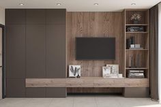 a living room with a television on the wall and bookshelves next to it