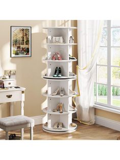 there is a white shelf with many pairs of shoes on it and a chair in the corner