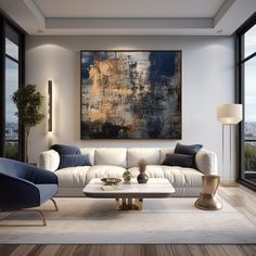 a living room filled with furniture and a large painting on the wall above it's windows