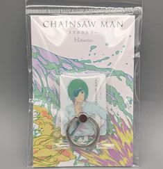 an anime character keychain with a ring attached to it's front in a package