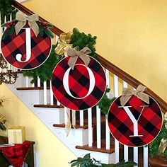 christmas decorations hanging on the banister