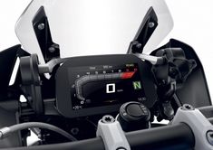 the gauges on the handlebars of a motorcycle