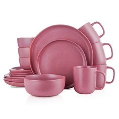 pink dinnerware set with cups and saucers