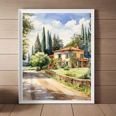 a watercolor painting of a house in the countryside