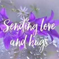 purple flowers with the words sending love and hugs