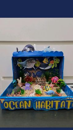 an ocean habitat is displayed on a table