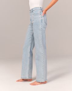 On-trend 90's-style high rise relaxed jeans, that are slim at the top with a wider leg shape, featuring a full-length leg, light indigo wash and frayed hem. High Rise Cargo Jeans For Spring, High Rise Rigid Denim Flare Jeans For Everyday, Trendy Mid-rise Jeans For Elevated Casual, Spring Wide Leg Mom Jeans, Trendy Mid-rise Jeans For Elevated Casual Occasions, High Waist Jeans For Everyday Spring Wear, Spring High Waist Jeans For Everyday, Spring High Waist Everyday Jeans, Light Wash Wide Leg Mom Fit Bottoms